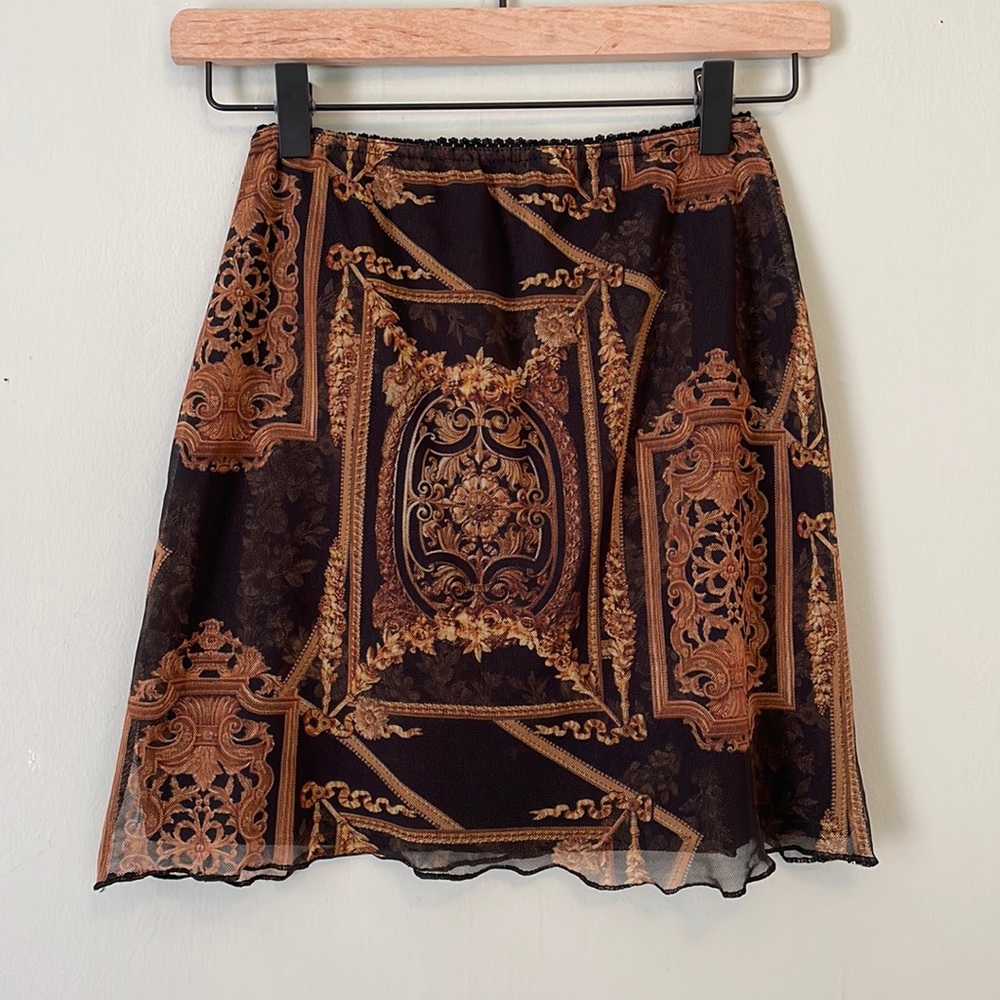 Size 4 / Pretty Little Thing mini skirt
